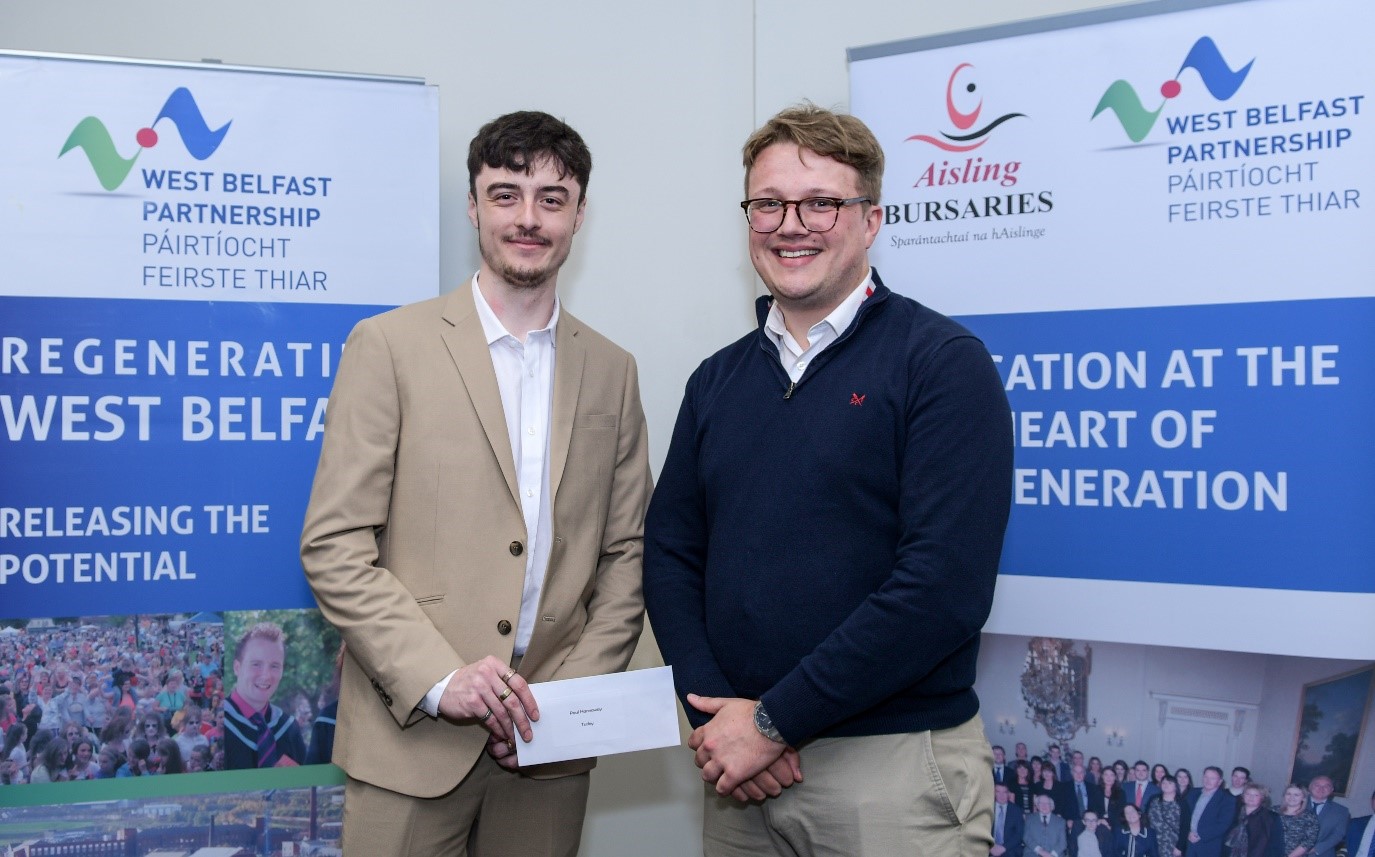 Caption (R-L: Michael Jardine, Senior Consultant, Turley, presented a bursary to Paul Hannaway, who plans to continue his studies in Communication, Advertising and Marketing at Ulster University).